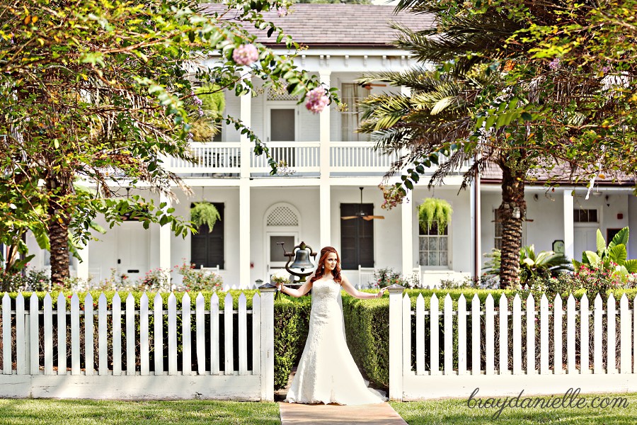 bride standing in the maze garden at plantation by Bray Danielle Photography 