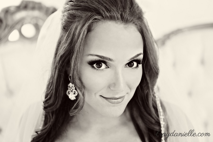 close up of brides face and large earings by Bray Danielle Photography 