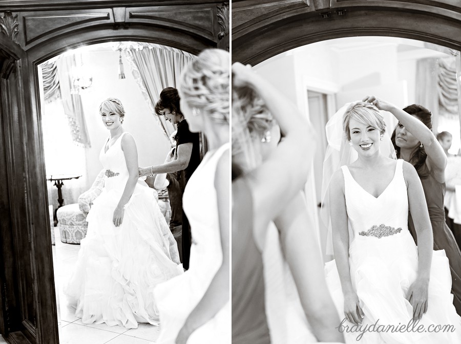 Happy bride in mirror