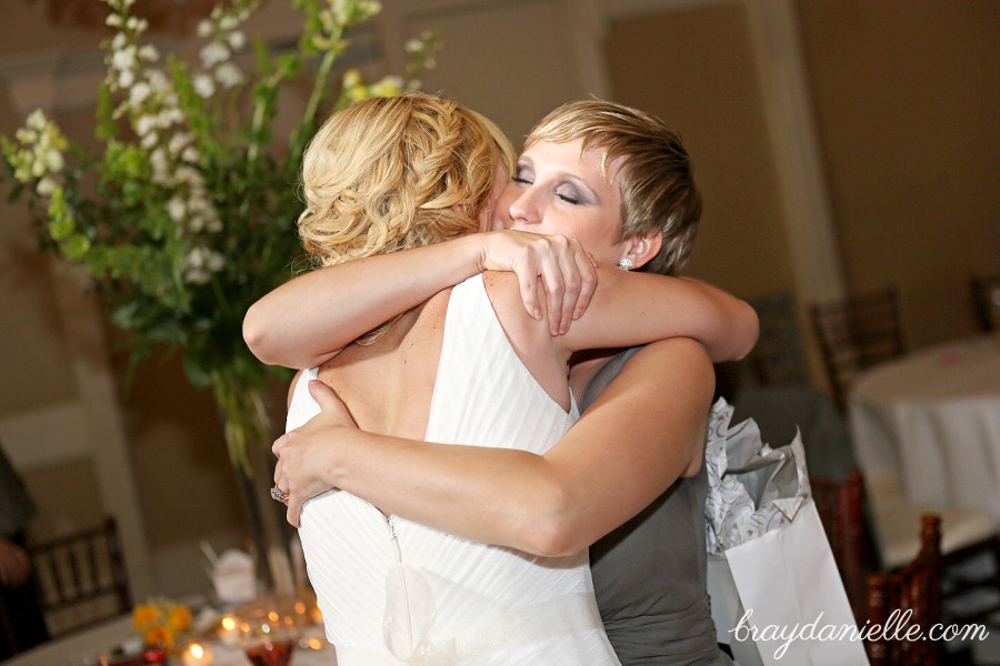 bride hugging guest