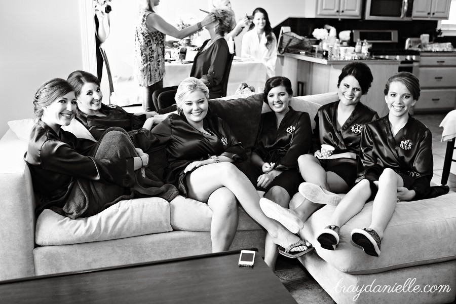 Wedding bridal party sitting on couch