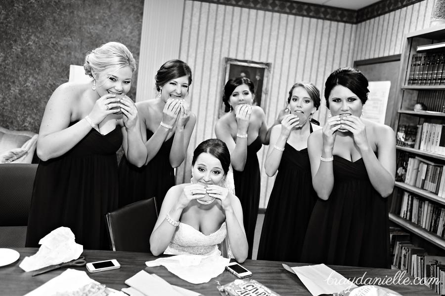 Bridal party eating burgers