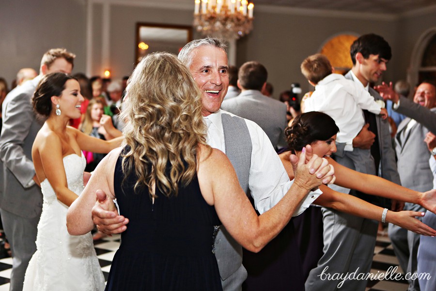 brides parents dancing