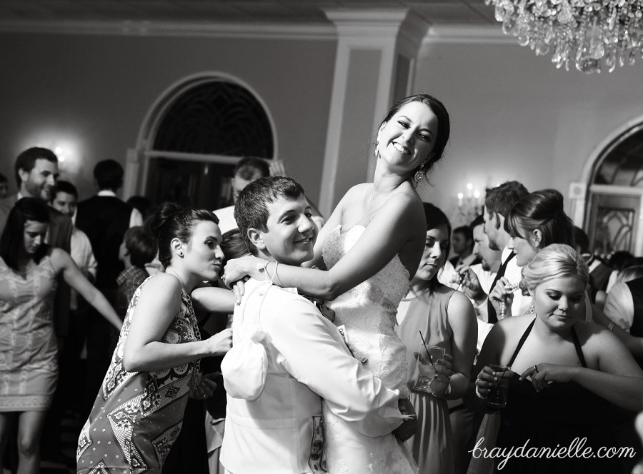 groom picking up the bride