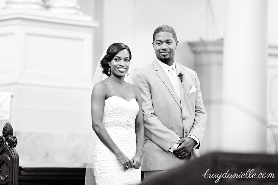 Bride and groom during ceremony, wedding at St Louis Cathedral in New Orleans