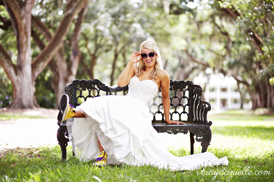 bride with LSU hightops and sunglasses by Bray Danielle Photography 