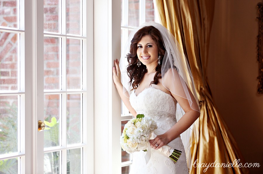 bridal portrait by large window in plantation by Bray Danielle Photography 